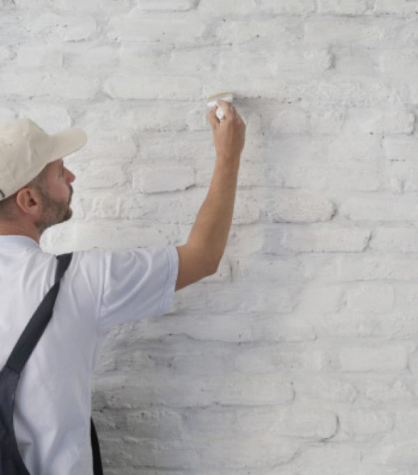 Man painting wall